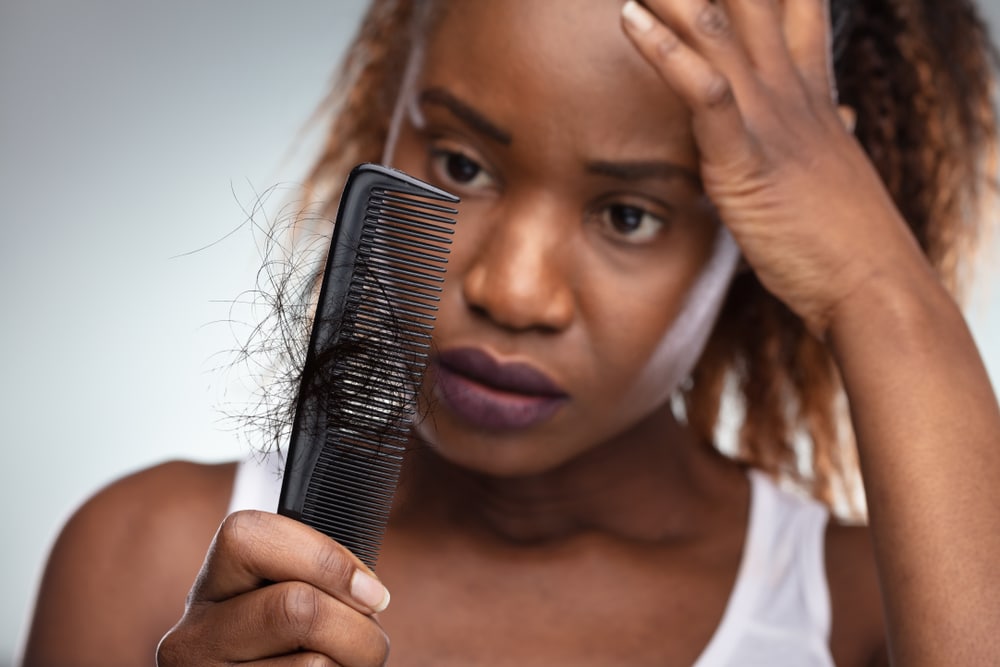femme cheveu afro alopécie de traction